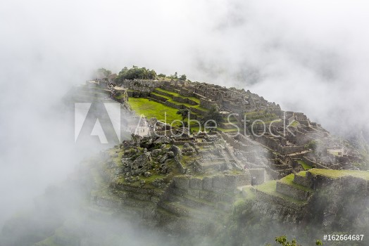 Picture of Machu Picchu in the clouds